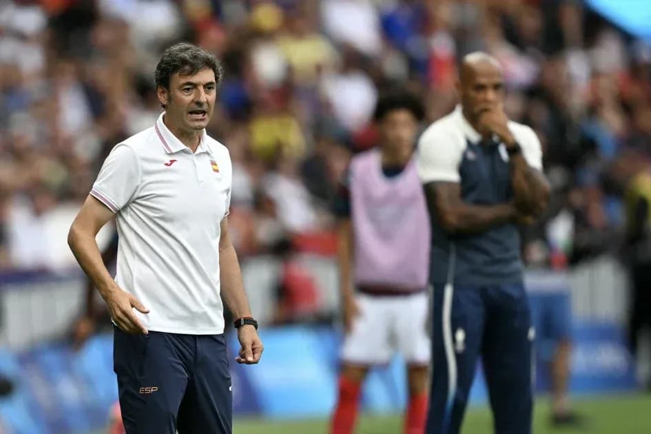 Coach giving instructions on the sidelines during match