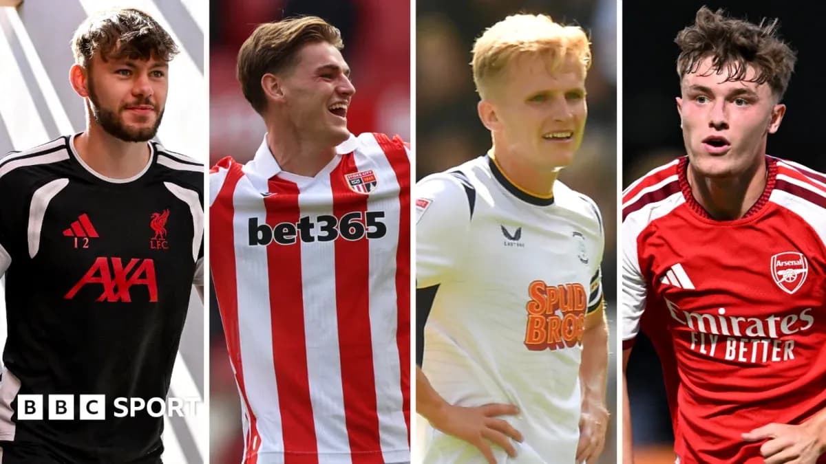 Four football players in club jerseys posing for photos