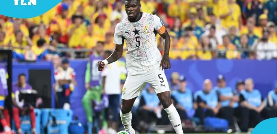 Ghana player dribbling during a match in stadium