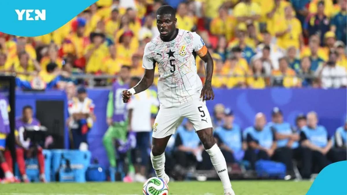 Ghana player dribbling during a match in stadium
