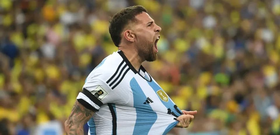 Player celebrating passionately in Argentina jersey