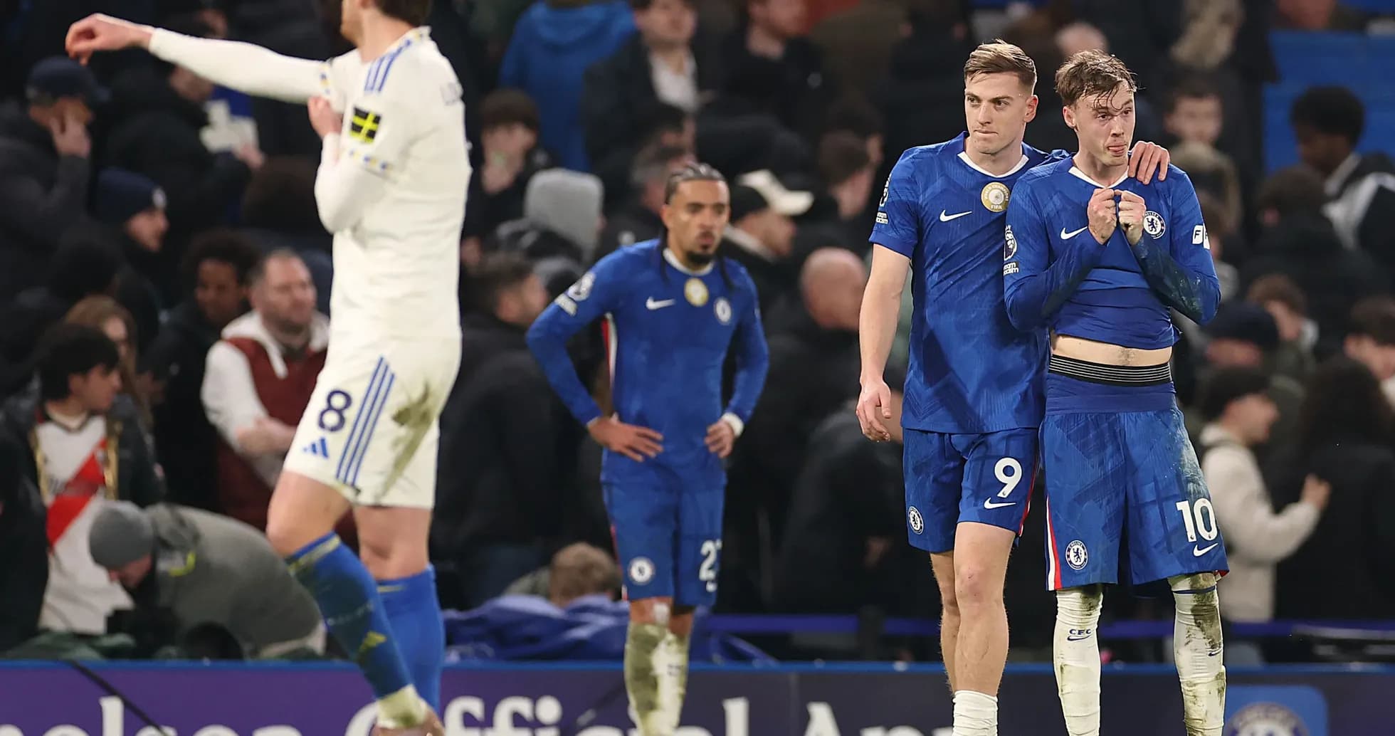 Chelsea players walking off the pitch after match