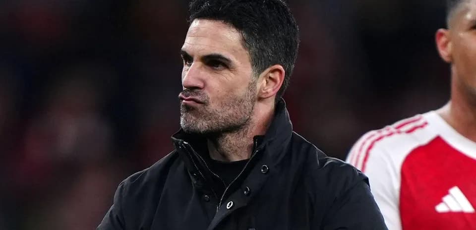 Manager celebrating after a match on the sidelines