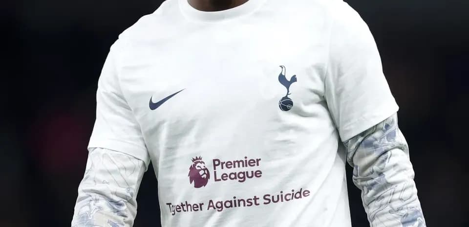 Player wearing Tottenham shirt before match
