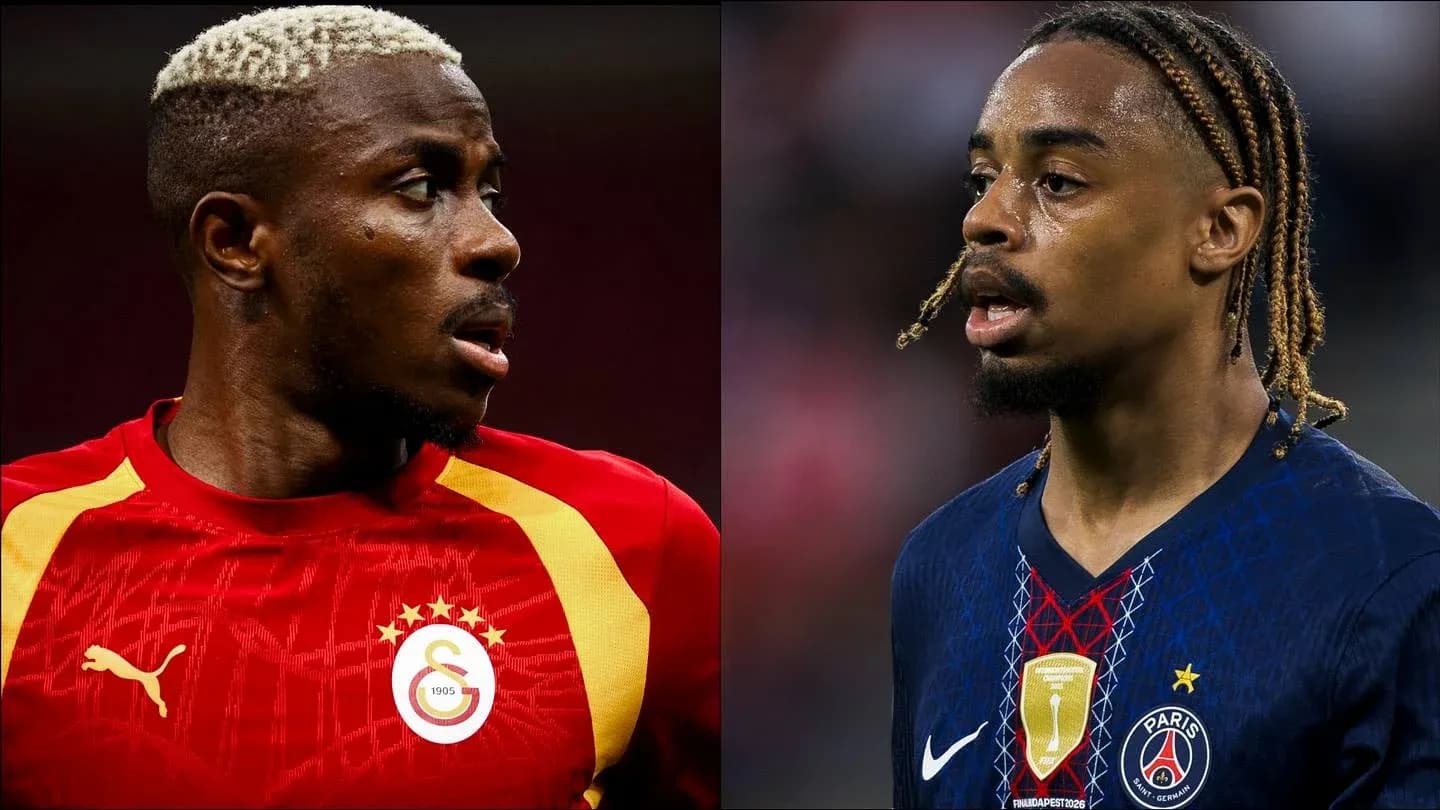 Two soccer players in club jerseys facing each other