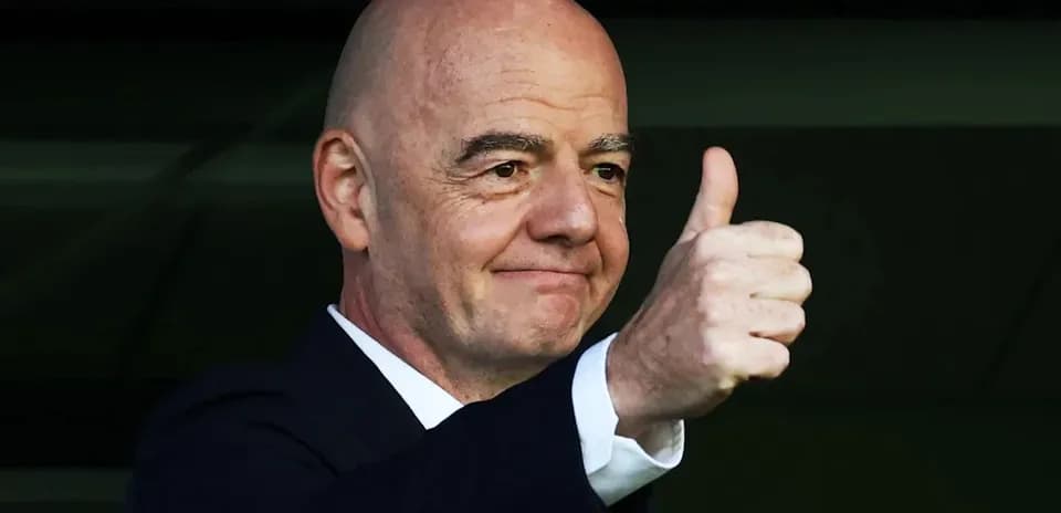 Man giving a thumbs up from a balcony