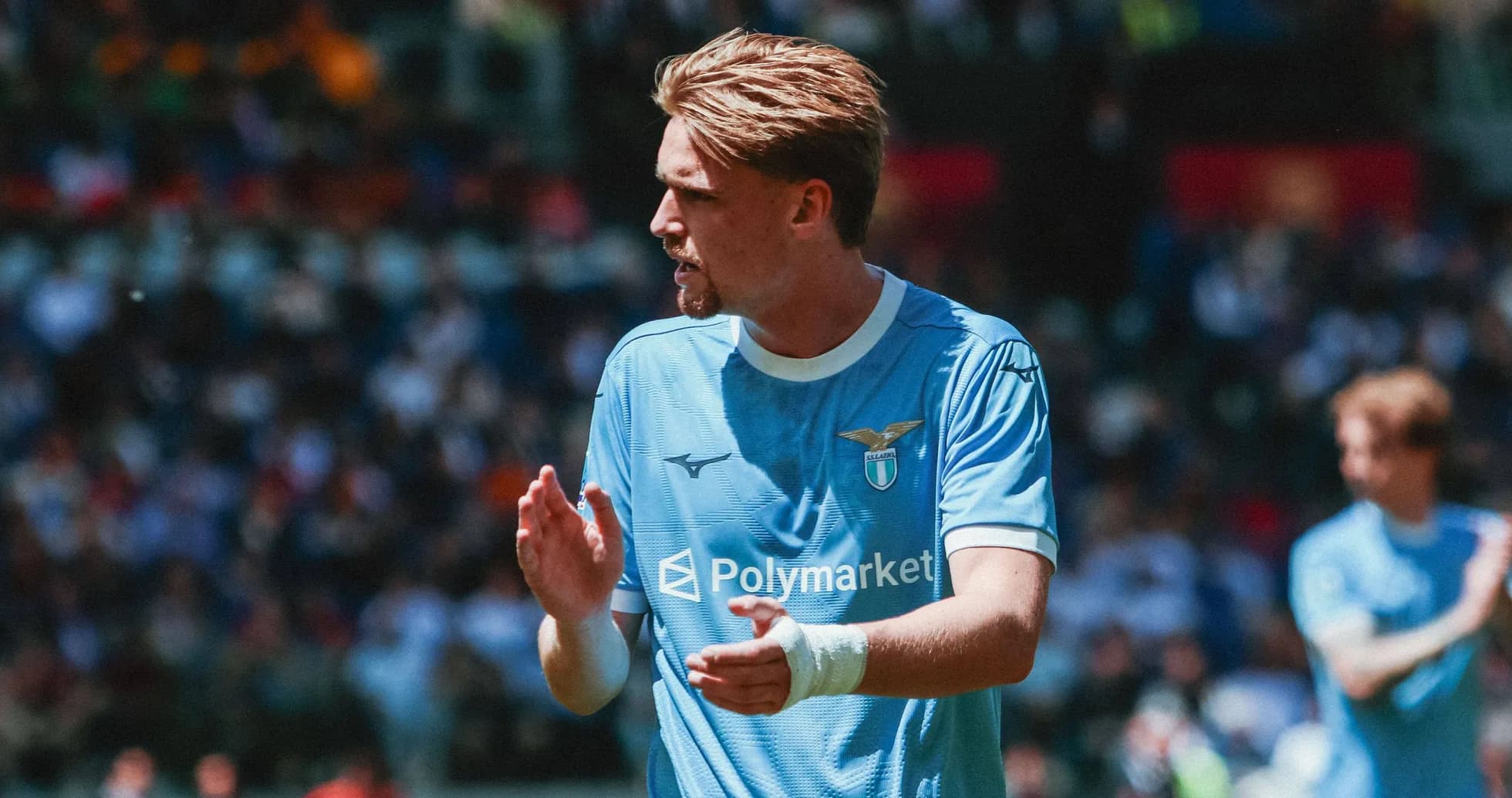 Lazio player clapping during match celebration