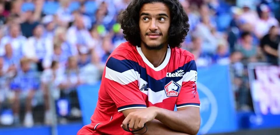Player sitting on the sidelines during match