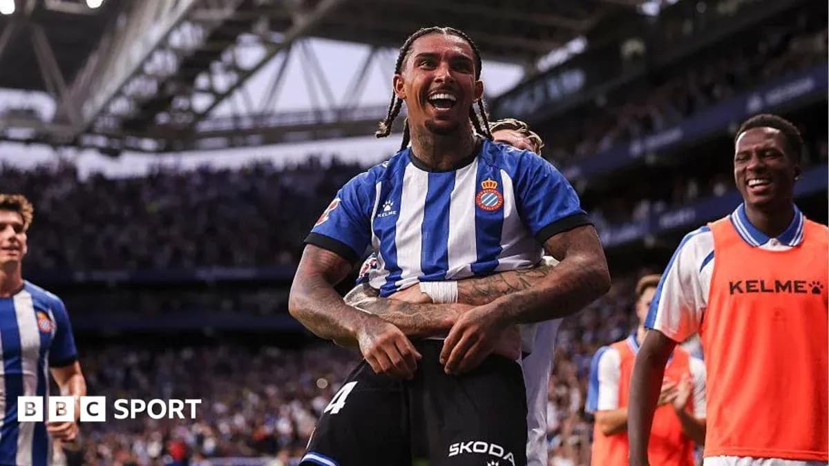 Espanyol player celebrating a goal with teammates