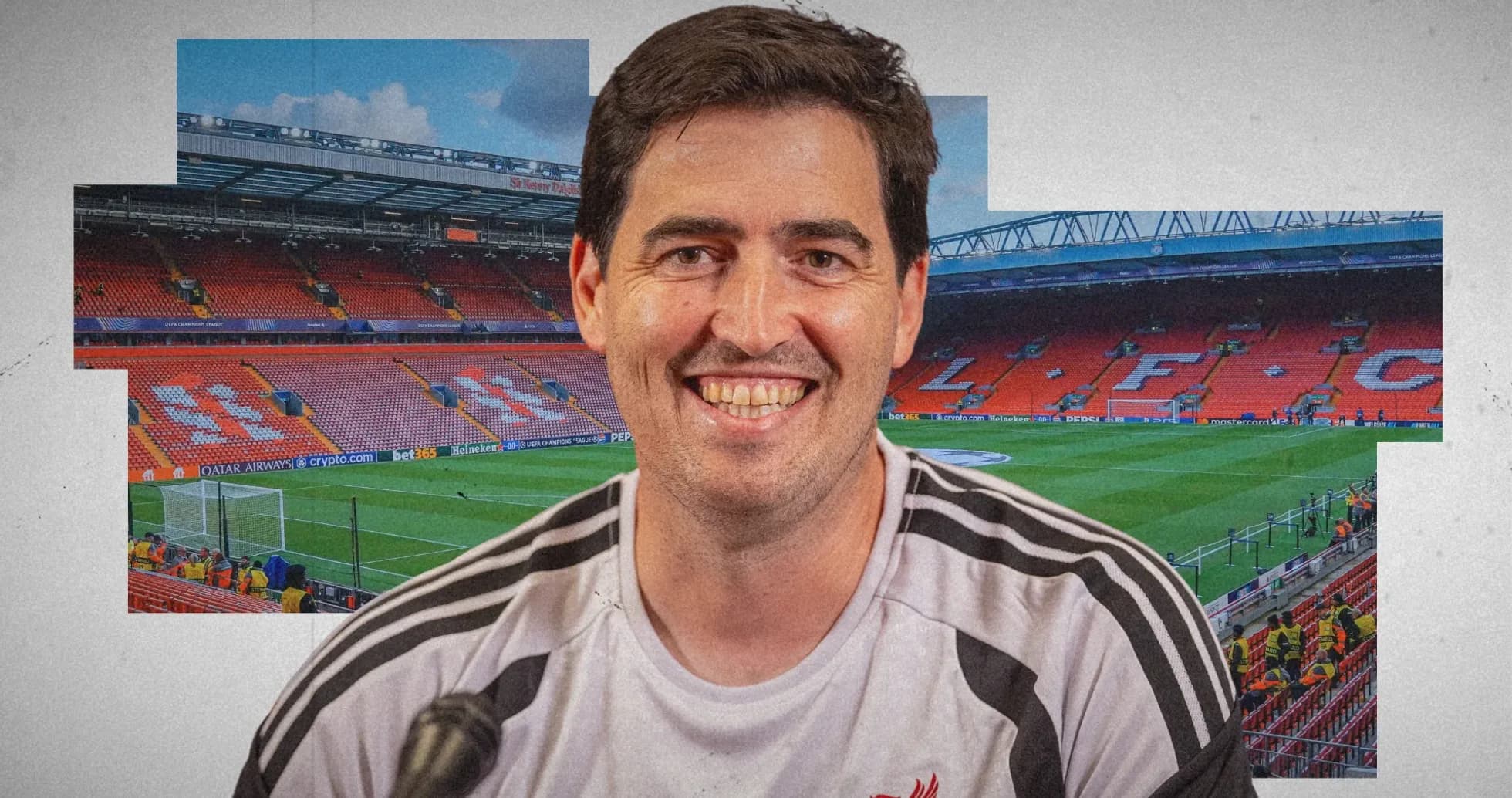 Man smiling in Liverpool FC training shirt at stadium