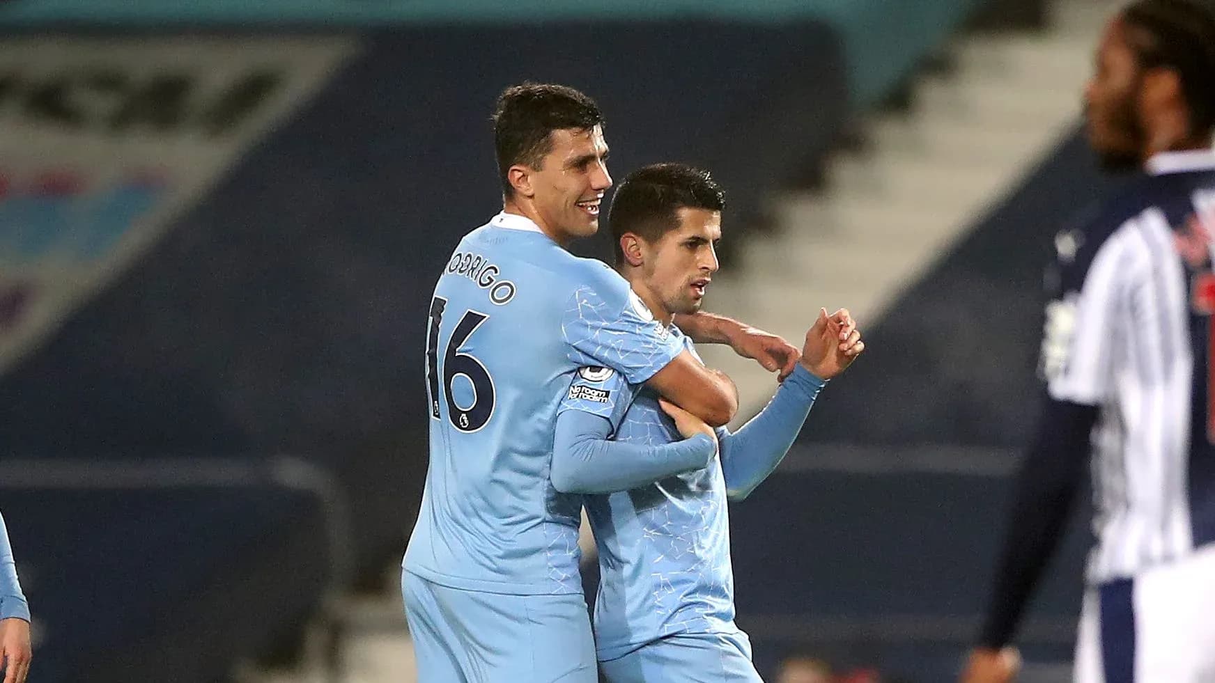 Two players celebrating after scoring a goal