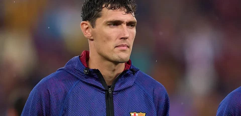 Player wearing Barcelona jacket during match warm-up