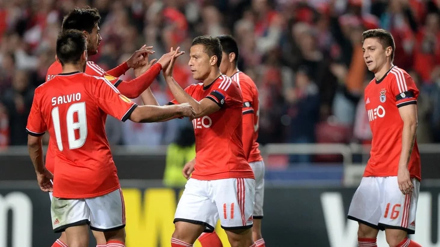 Benfica players celebrating during Europa League match