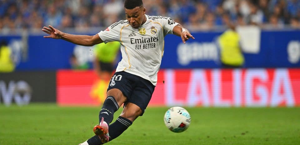 Player shooting the ball during Real Madrid match