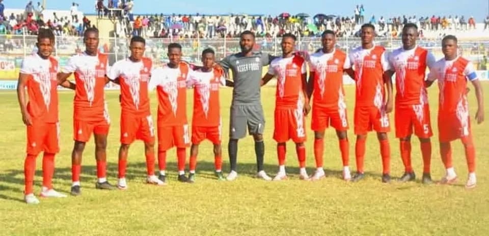 Kano Pillars team posing for a group photo