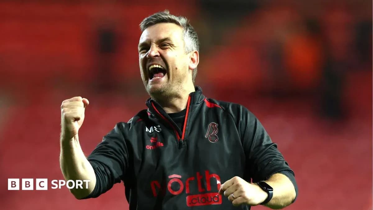 Coach celebrating enthusiastically after match victory