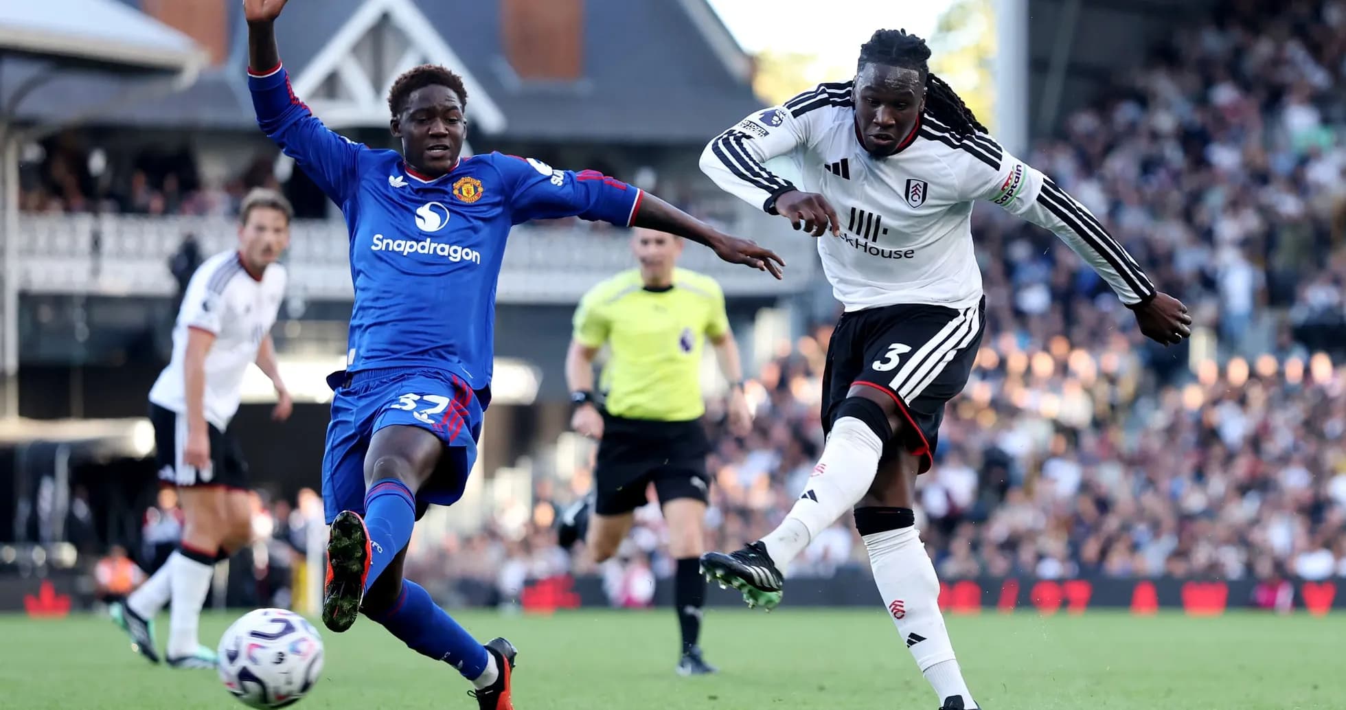 Fulham player in action against Manchester United