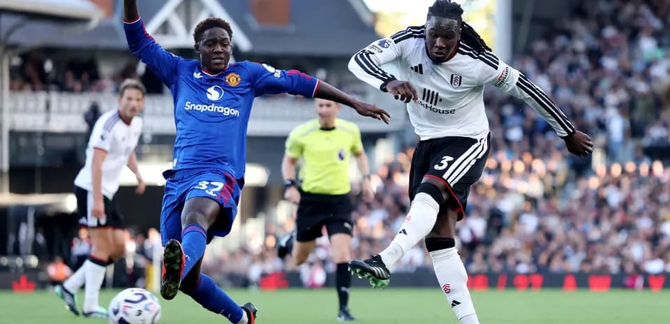 Fulham player in action against Manchester United