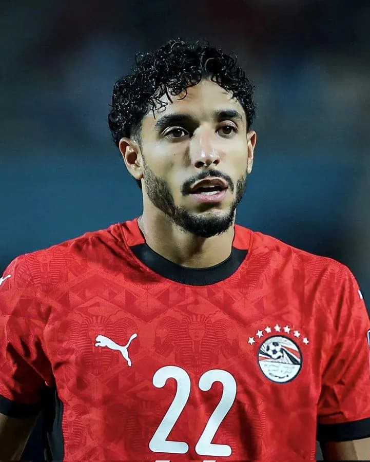 Player in red jersey during match for Egypt
