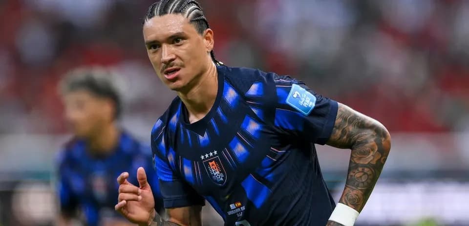 Player in blue jersey during football match