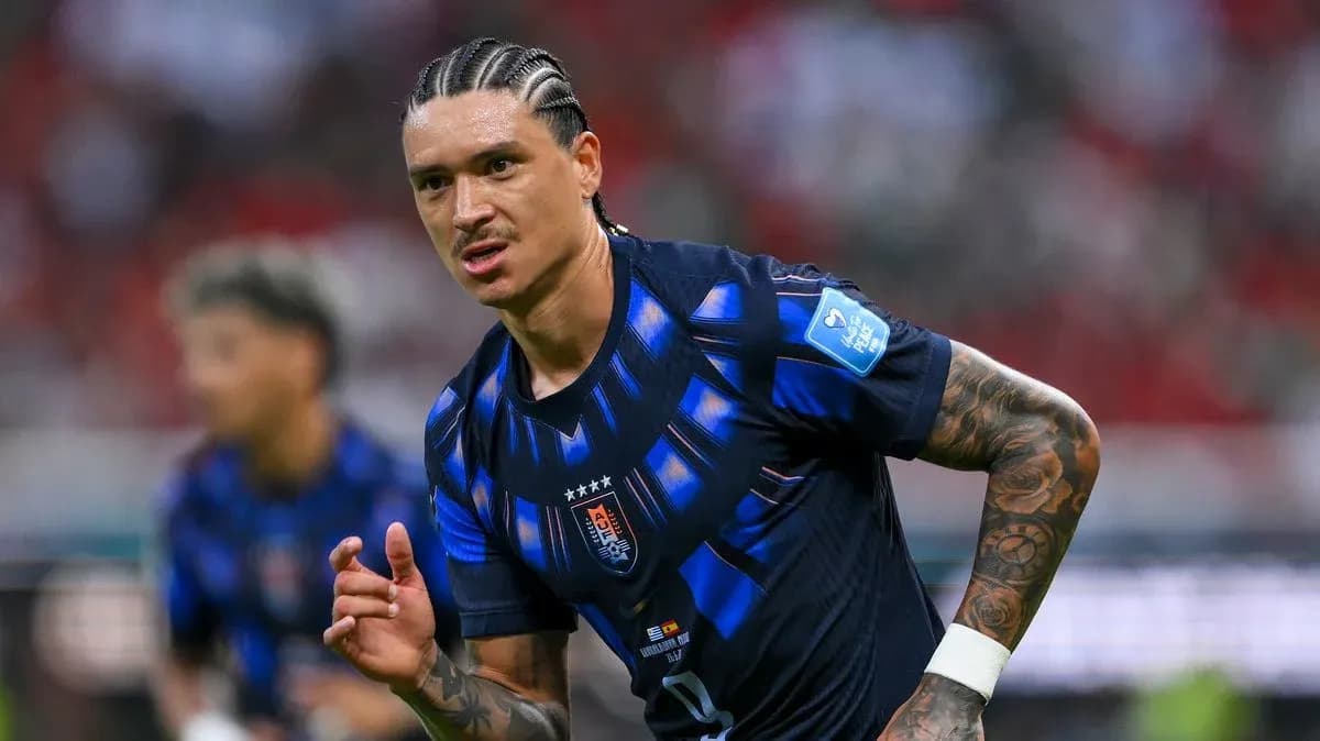 Player in blue jersey during football match