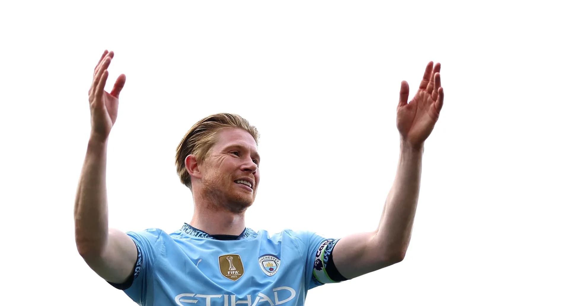 Player celebrating with raised arms on field