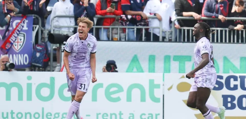 Celebrating players from Udinese during match