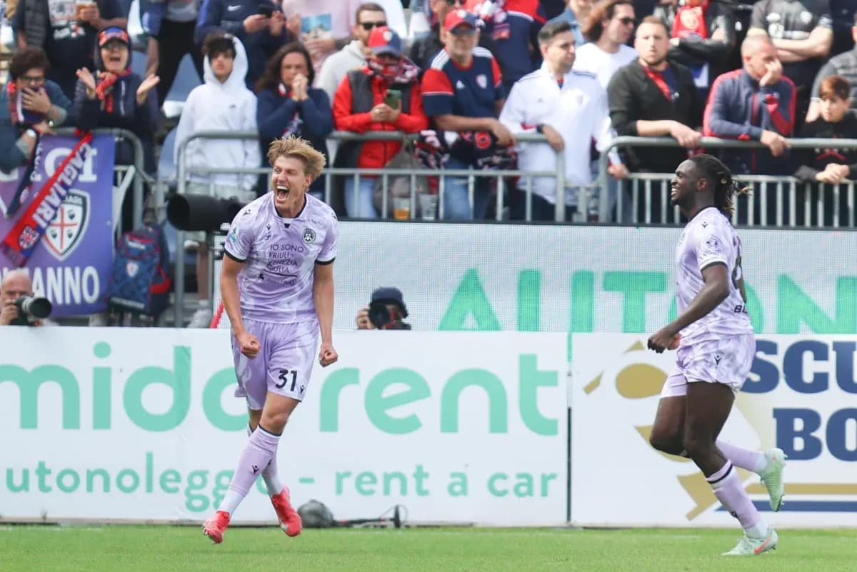 Celebrating players from Udinese during match