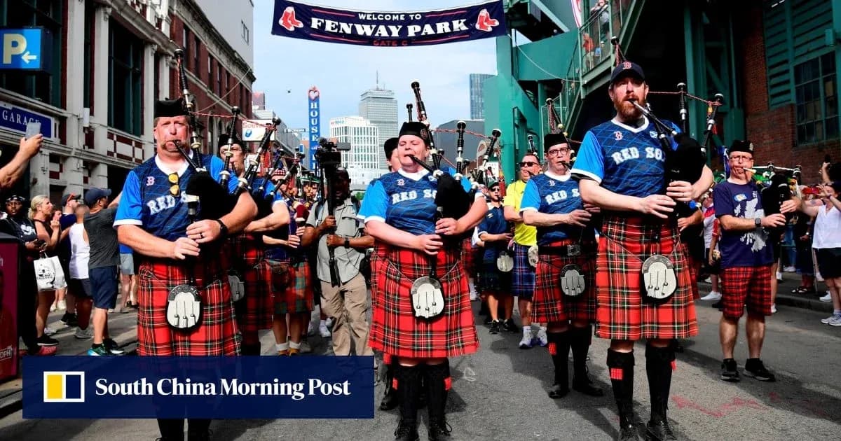 Bagpipers in kilts performing outside Fenway Park