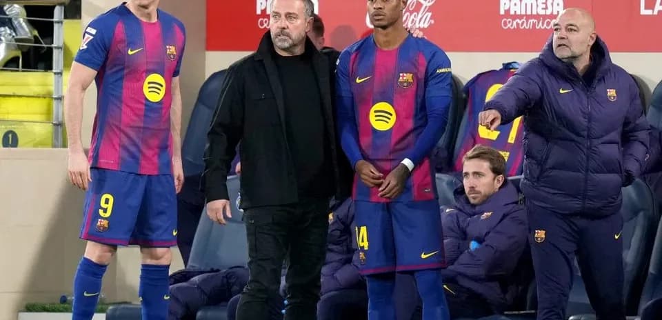 Barcelona players and staff on the bench during match