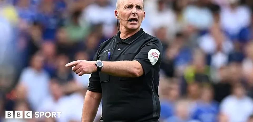 Referee giving instructions during a match
