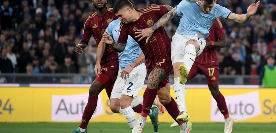 AS Roma players contesting a ball against Lazio
