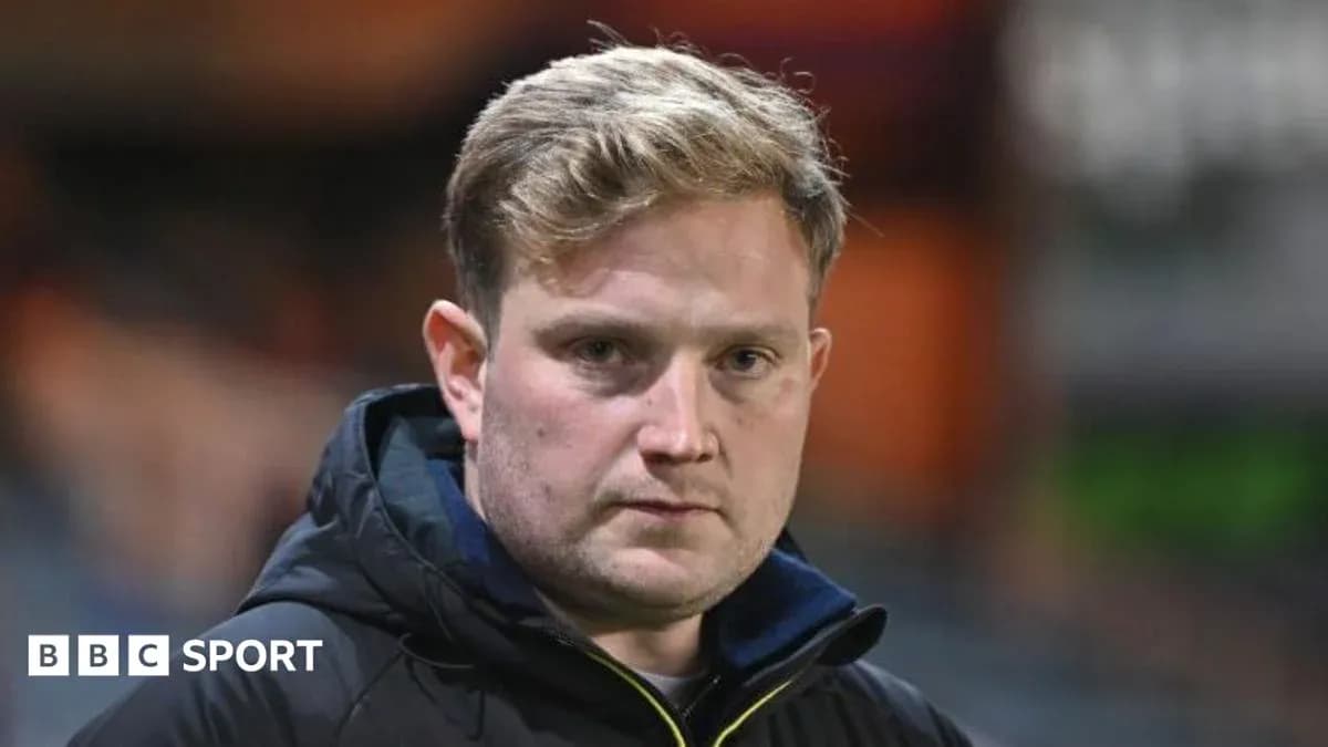 Coach looking serious during match preparations