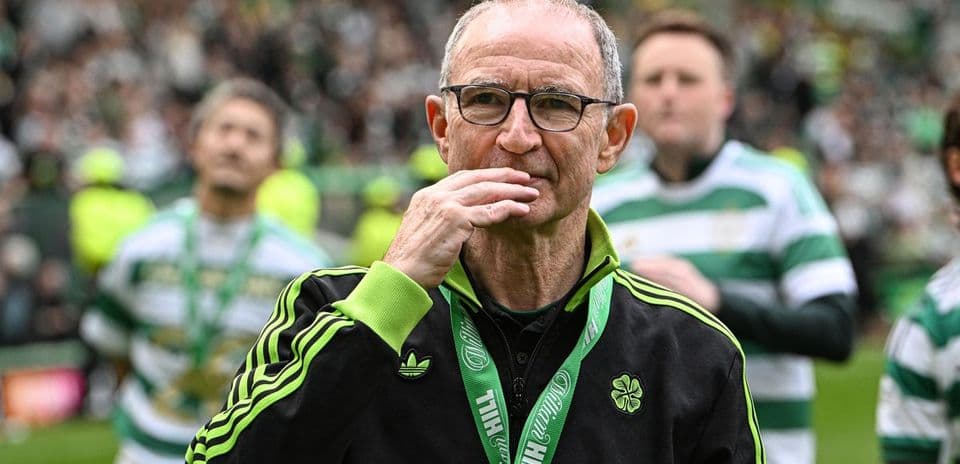 Celtic manager on pitch during celebratory event