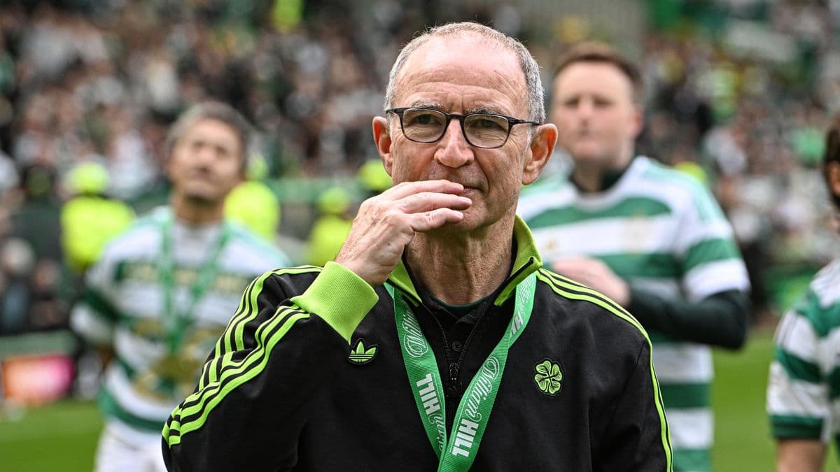 Celtic manager on pitch during celebratory event