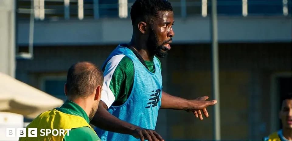 Player in training session interacting with teammates