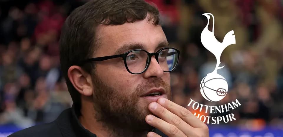 Man in glasses with Tottenham Hotspur logo background