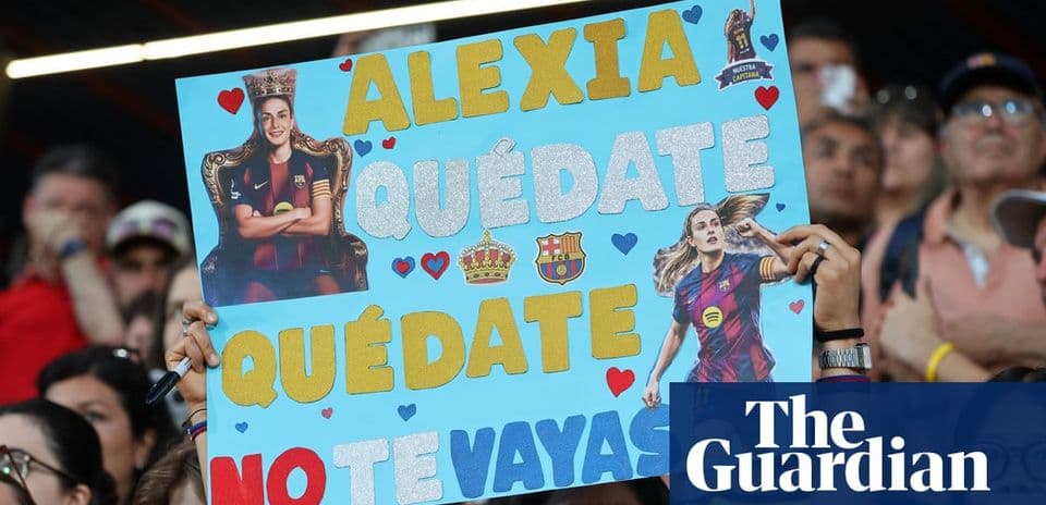 Fan holding sign supporting player at match