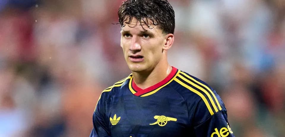 Player wearing Arsenal jersey during match