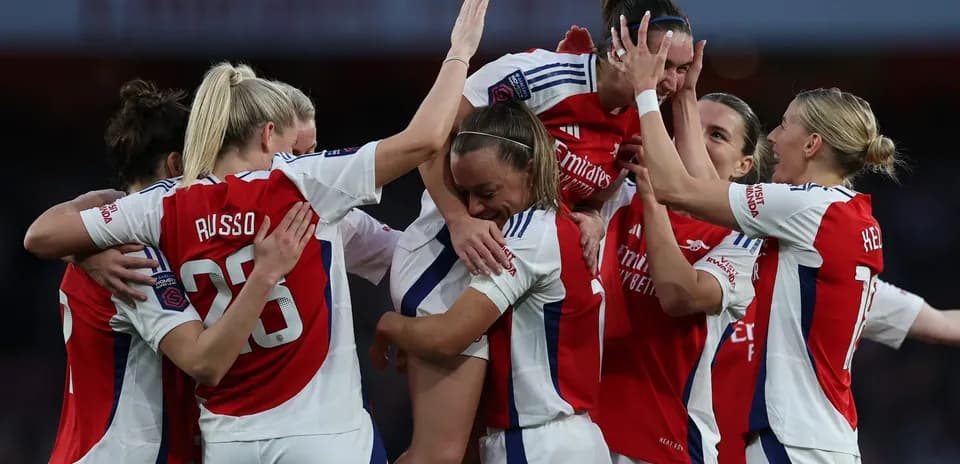 Arsenal W celebrating a goal during match