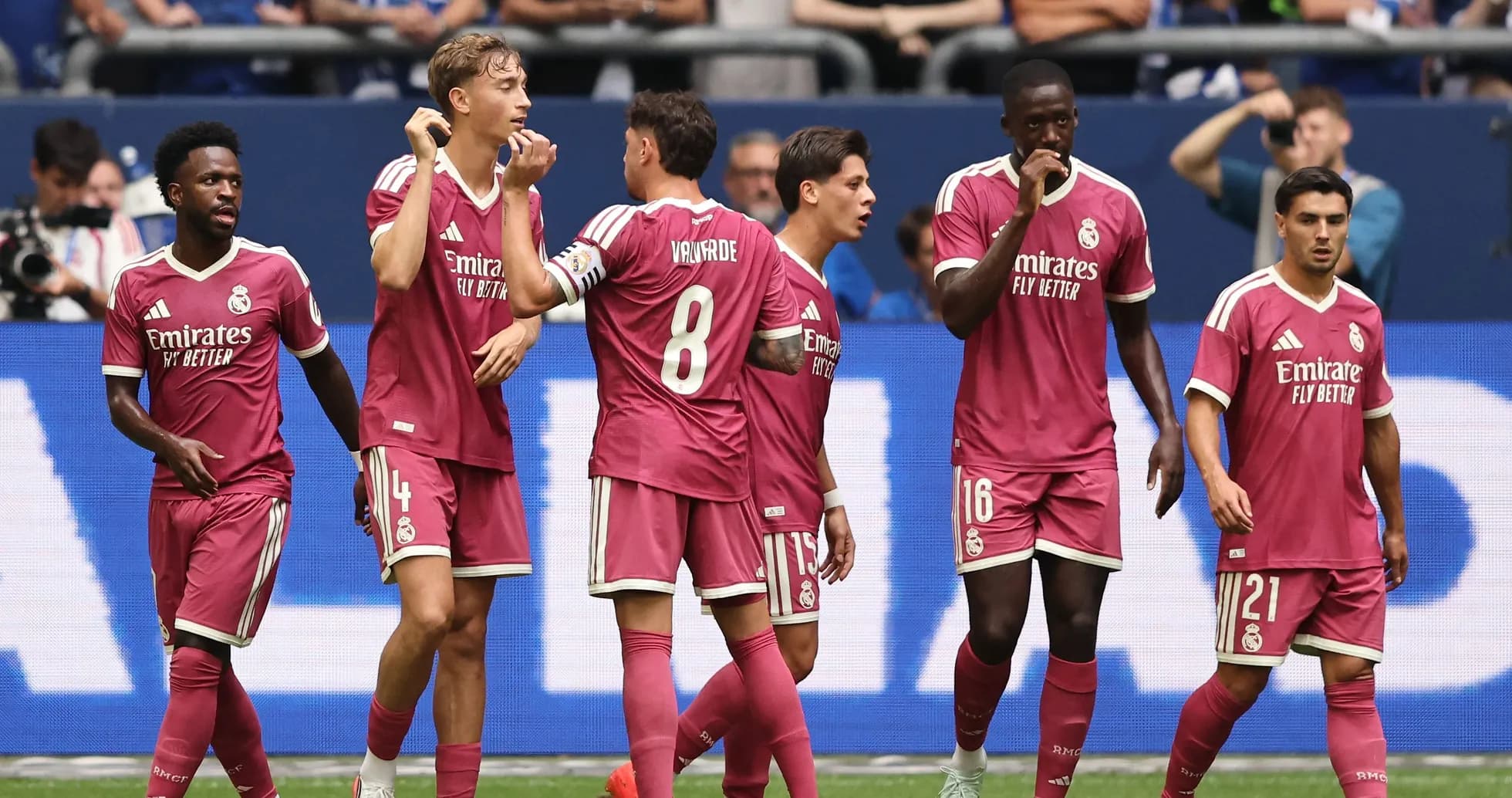 Real Madrid players celebrating a goal during match
