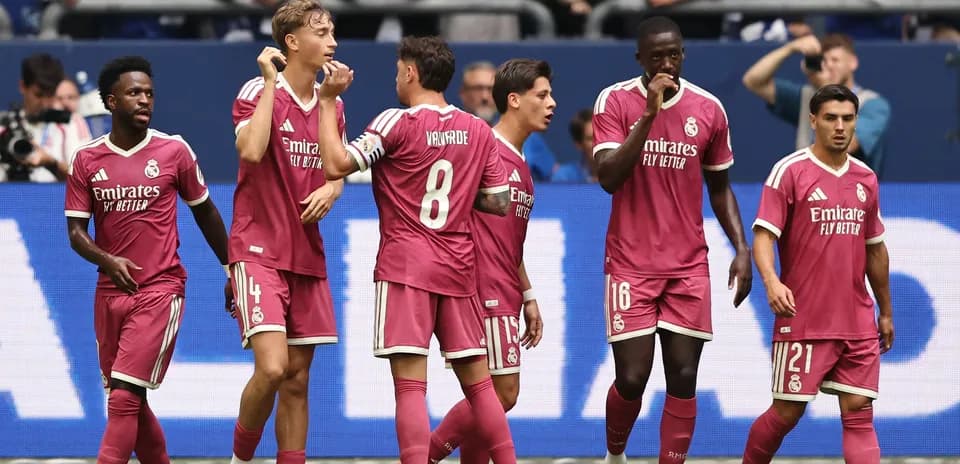 Real Madrid players celebrating a goal during match