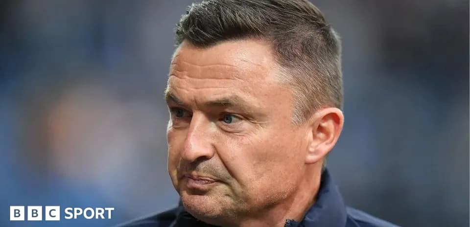 Coach looking serious during match preparations