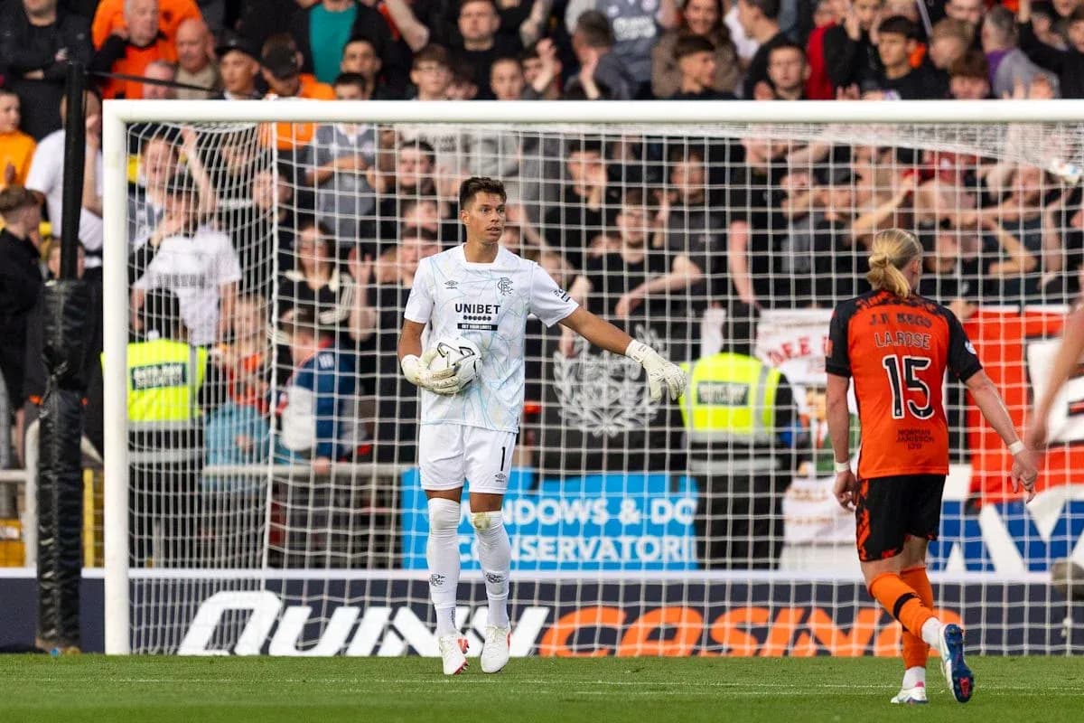 Goalkeeper in action during a tense moment