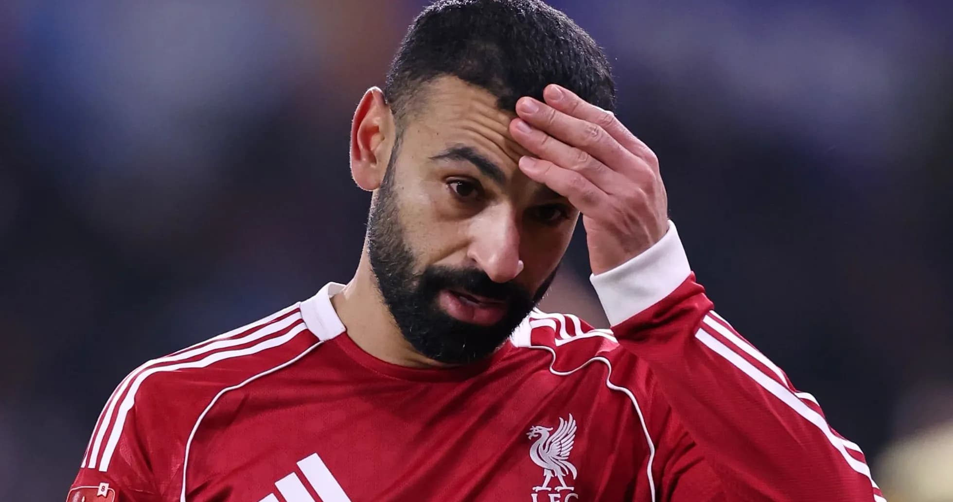 Mohamed Salah with hand on forehead during match