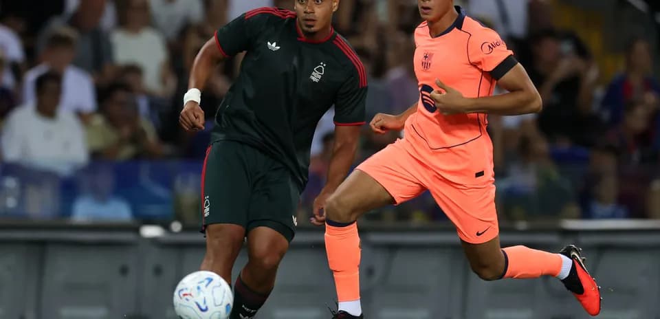 Two players competing for the ball during a match