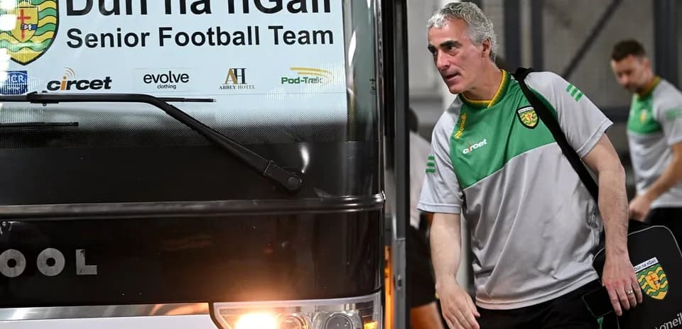 Manager exiting bus for Dún na nGall football team