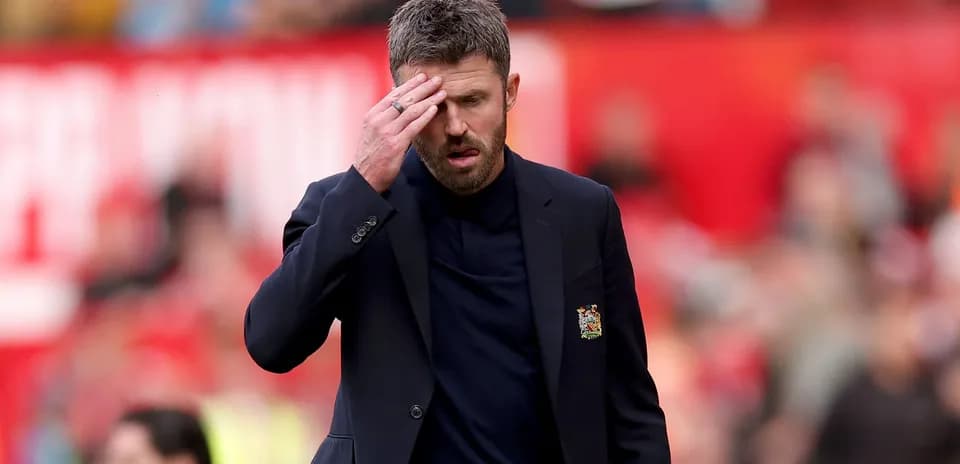 Manager walking on the pitch during match