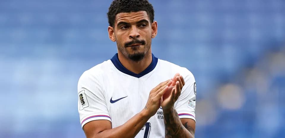 Football player applauding after a match
