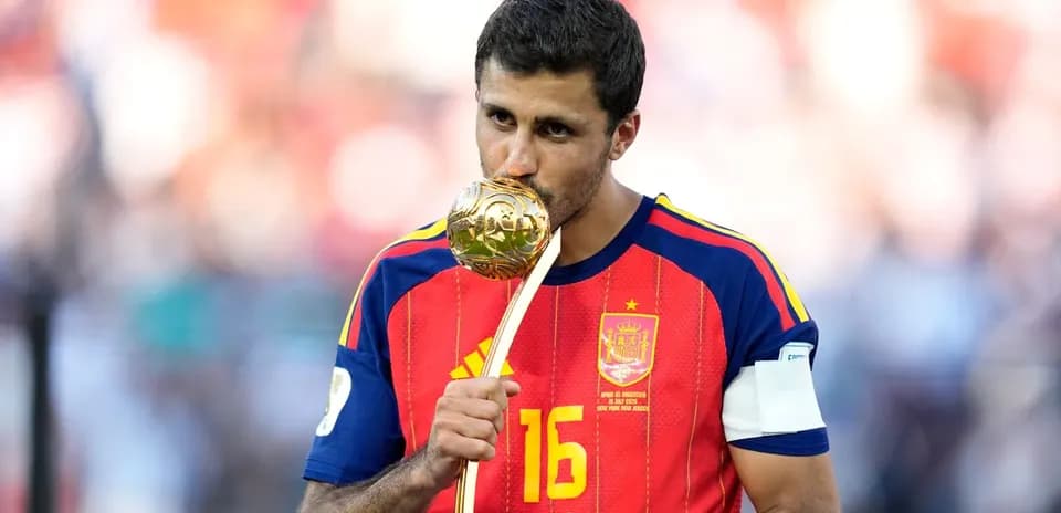 Player kissing trophy after winning championship